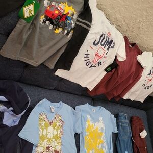 9 Pieces Of Boys Clothing - 7 Boys Shirts And  2 Pairs Of Pants Brand New w/tags